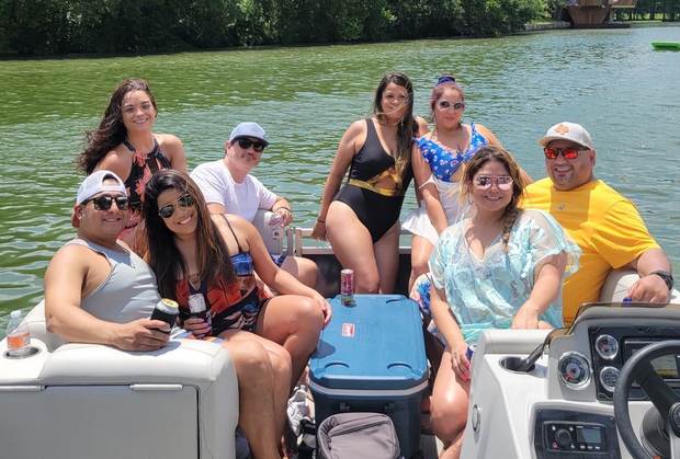 Family group ready to board their LakeTime pontoon charter