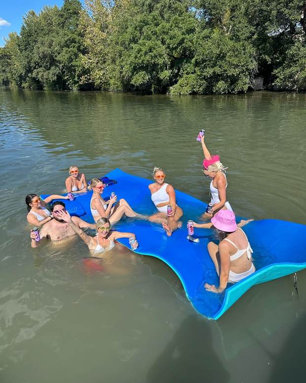 Group photo on the dock before a Lake Austin boat rental