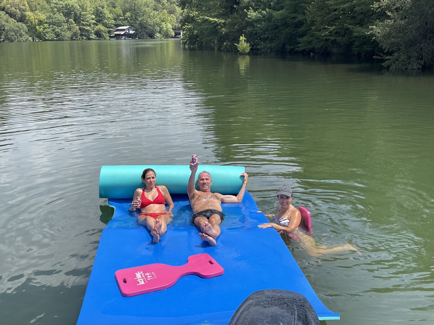 Group of women enjoying a sunny day aboard a LakeTime pontoon